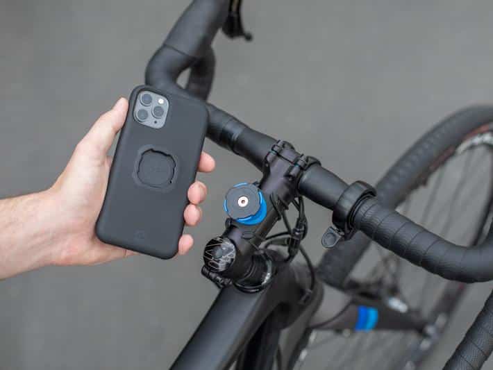 The Quad Lock mounting system is one way to carry your phone while cycling. Pictured here is the stem mount, as well as phone in the required case. 