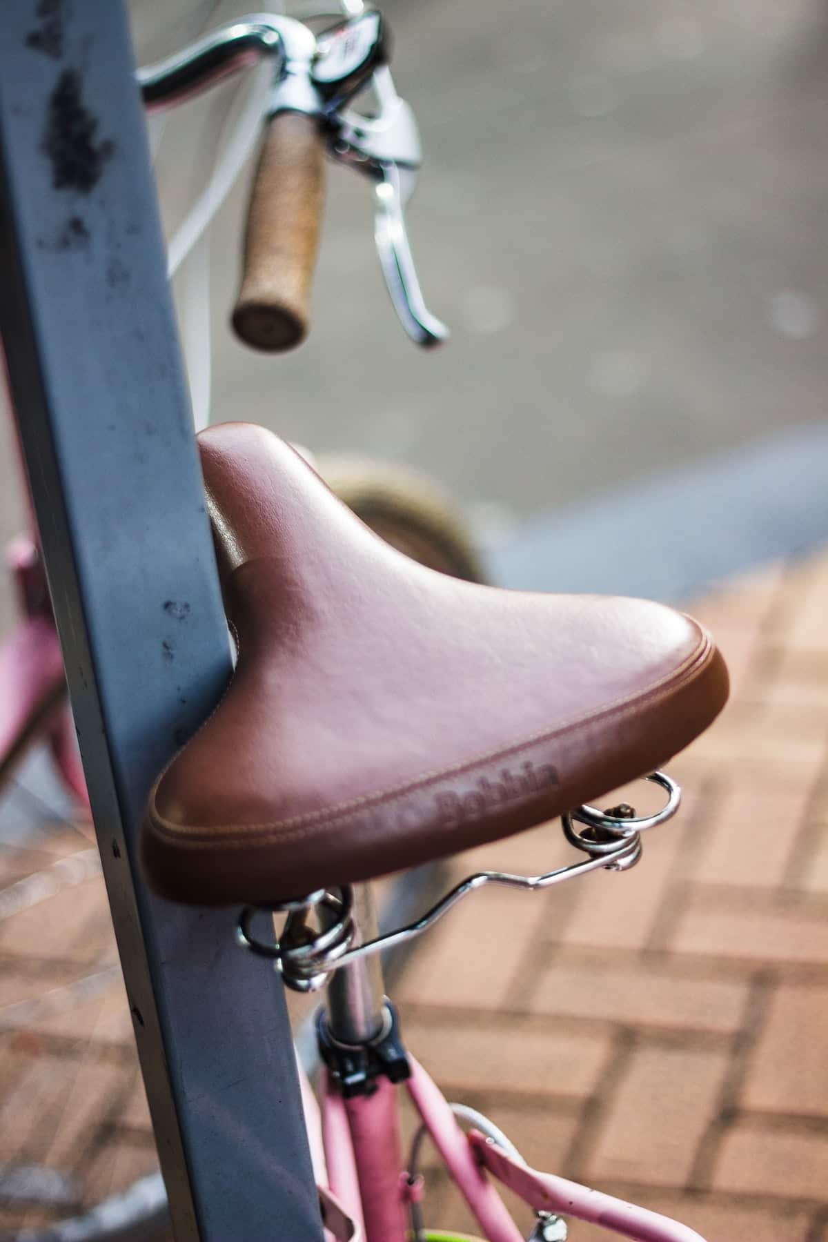 A brown cycle saddle.